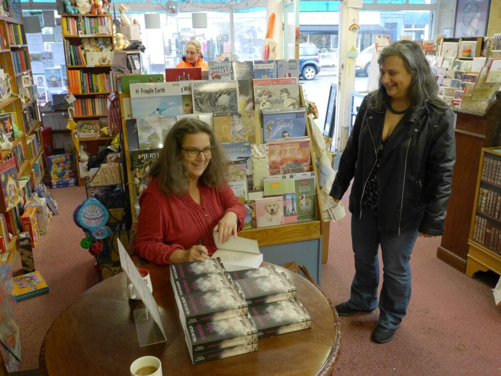 Sometimes When I Sleep book signing at Lee on Solent book store. The author signing a book for the first visitor of the day.